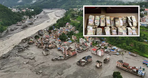 দৈনিক পূর্বকোণ - চট্টগ্রামের দৈনিক নেপালে বন্যায় ভেসে এলো ব্যাংকের লকার, এরপর শুরু হয় লুটপাট